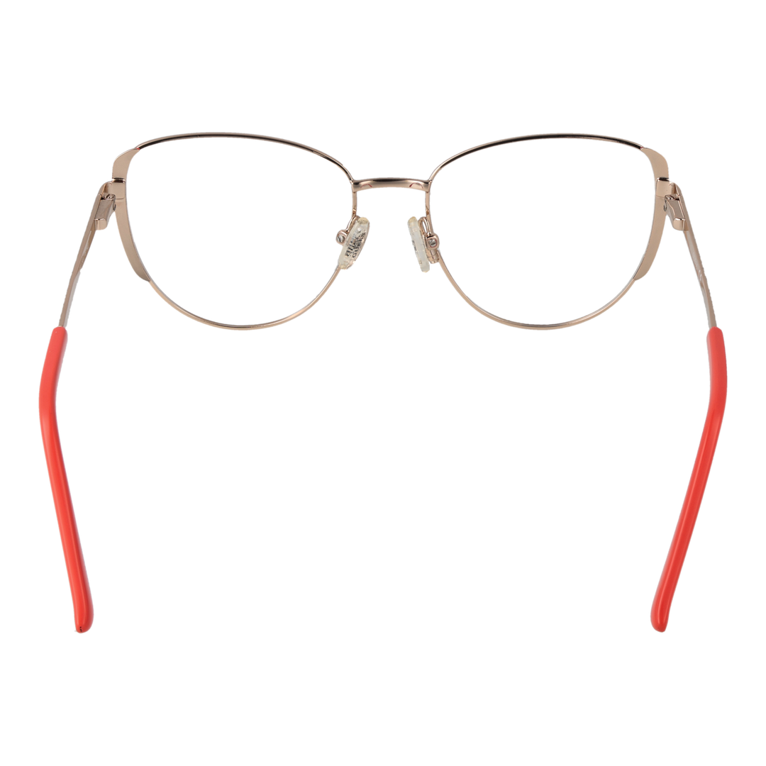 Gold metal cat-eye eyeglasses with coral temple tips, thin temples and adjustable nose pads on white background