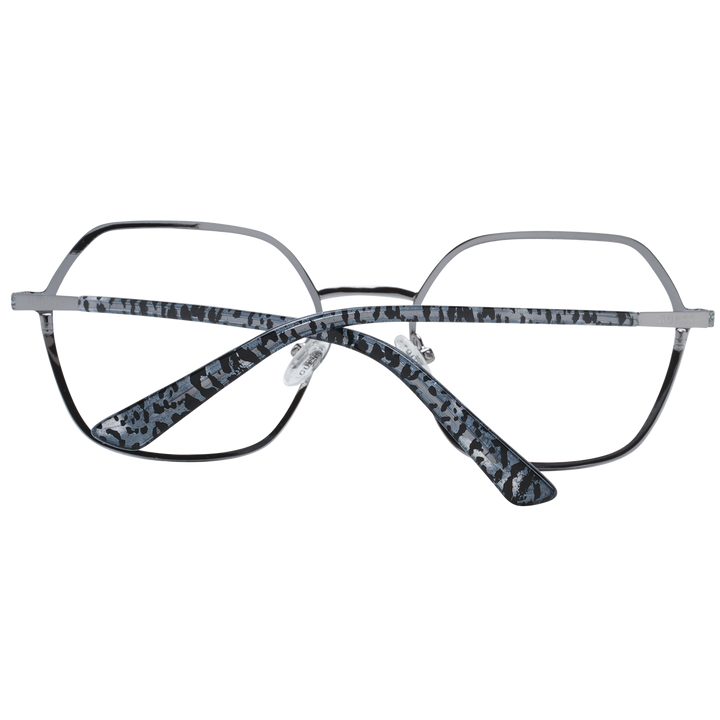 Blue metal hexagonal eyeglasses with silver glitter finish and patterned temple tips on white background