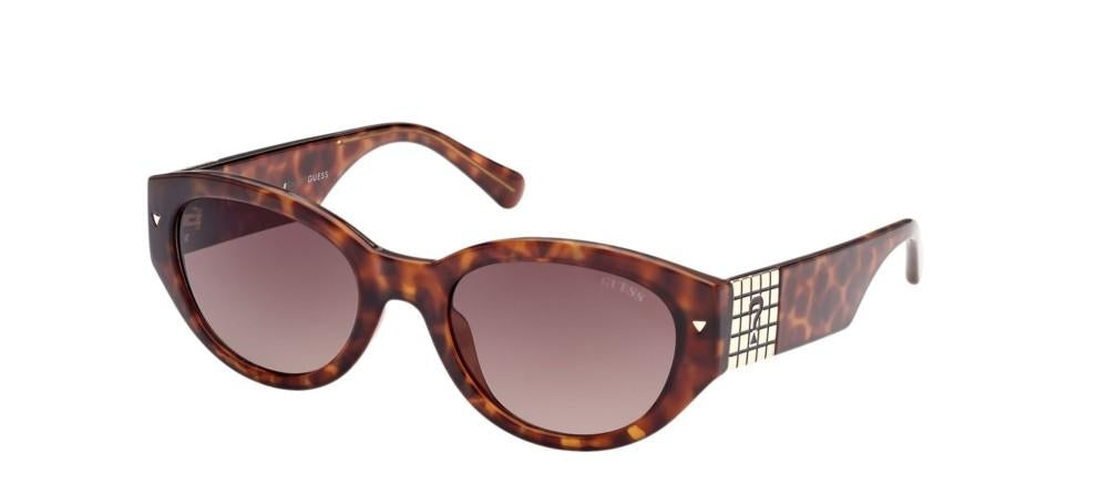 Tortoise cat-eye sunglasses with gradient lenses and metal temple grid, leather case and cleaning cloth