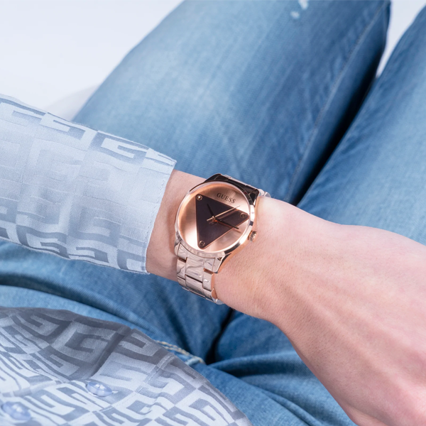 Rose gold stainless steel wristwatch on neutral background, 36mm case, mineral glass dial, adjustable bracelet