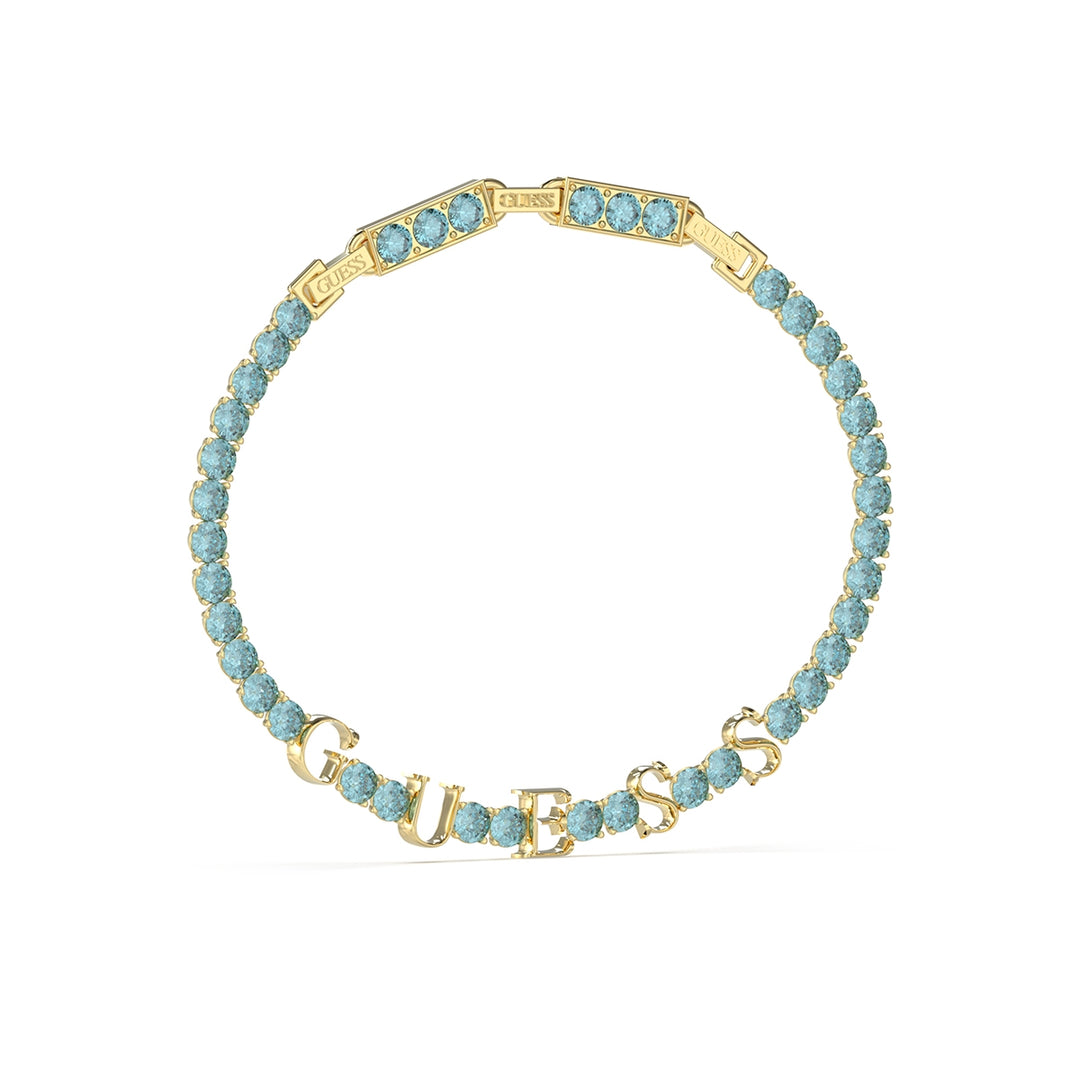 Gold-tone charm bracelet with round light-blue stones and GUESS letter charms on rectangular segments