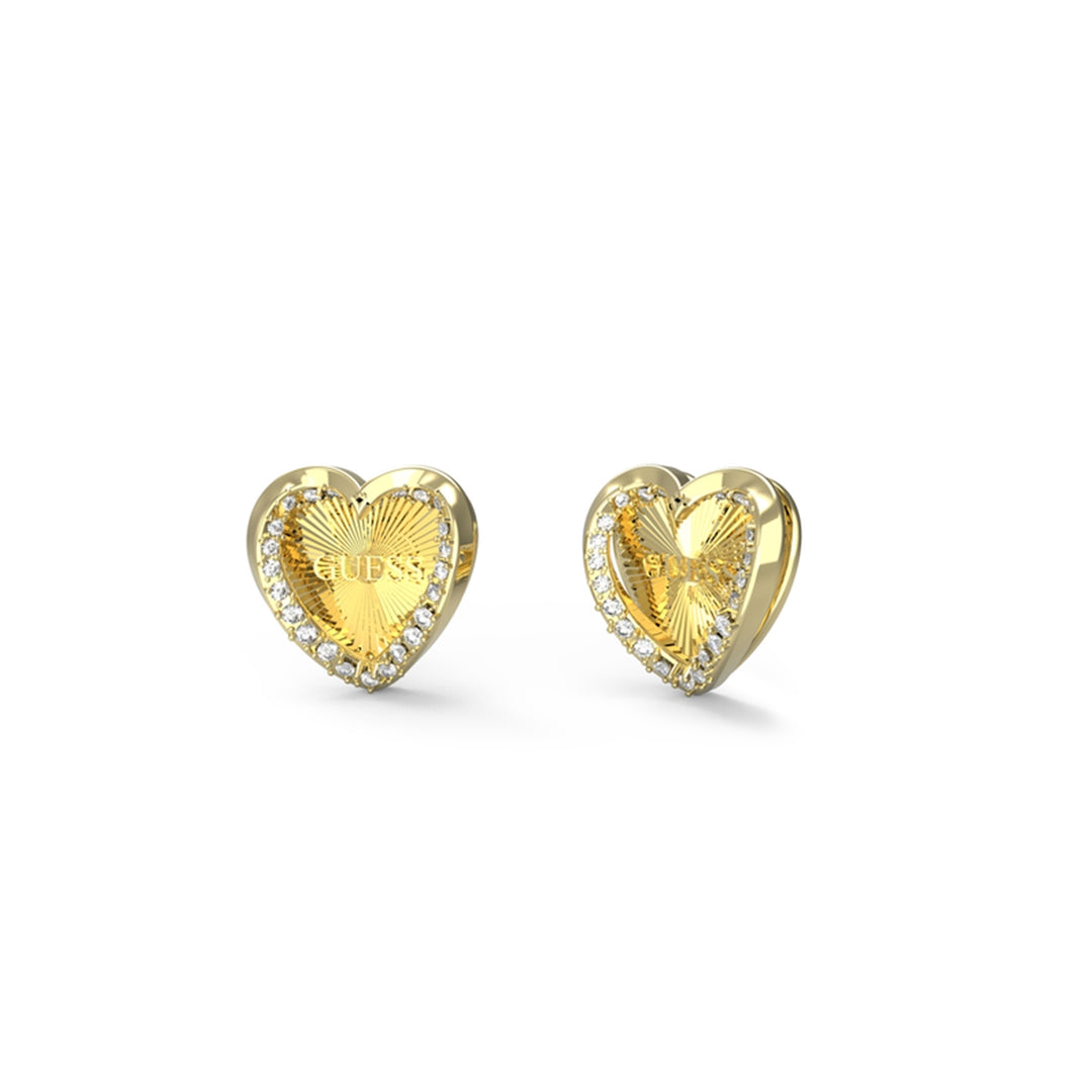 Gold heart stud earrings with clear stones around edge and radiating engraved center on white background