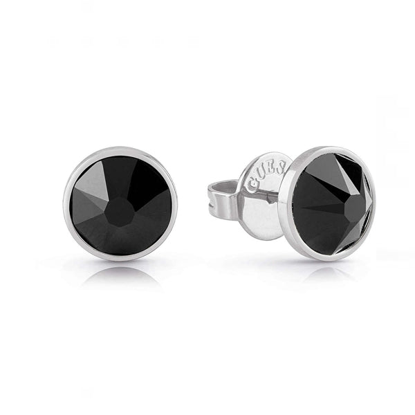 Close-up of unisex stud earrings with faceted black stones set in silver-tone metal, shown on white background