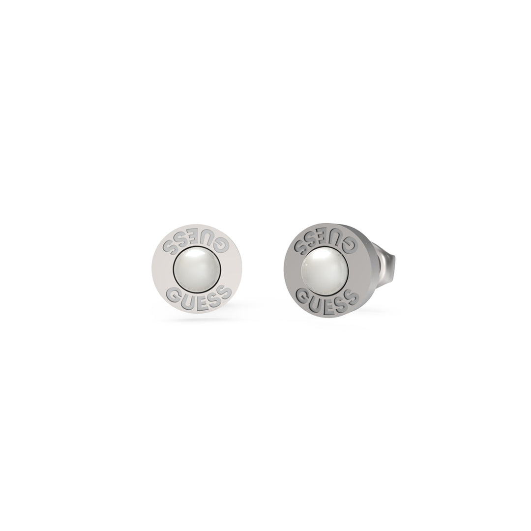 Pair of silver round stud earrings with pearl-like centers and engraved rim detail on white background