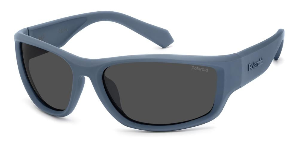 Blue plastic wrap-around sunglasses with black polarized lenses on white background, sporty profile