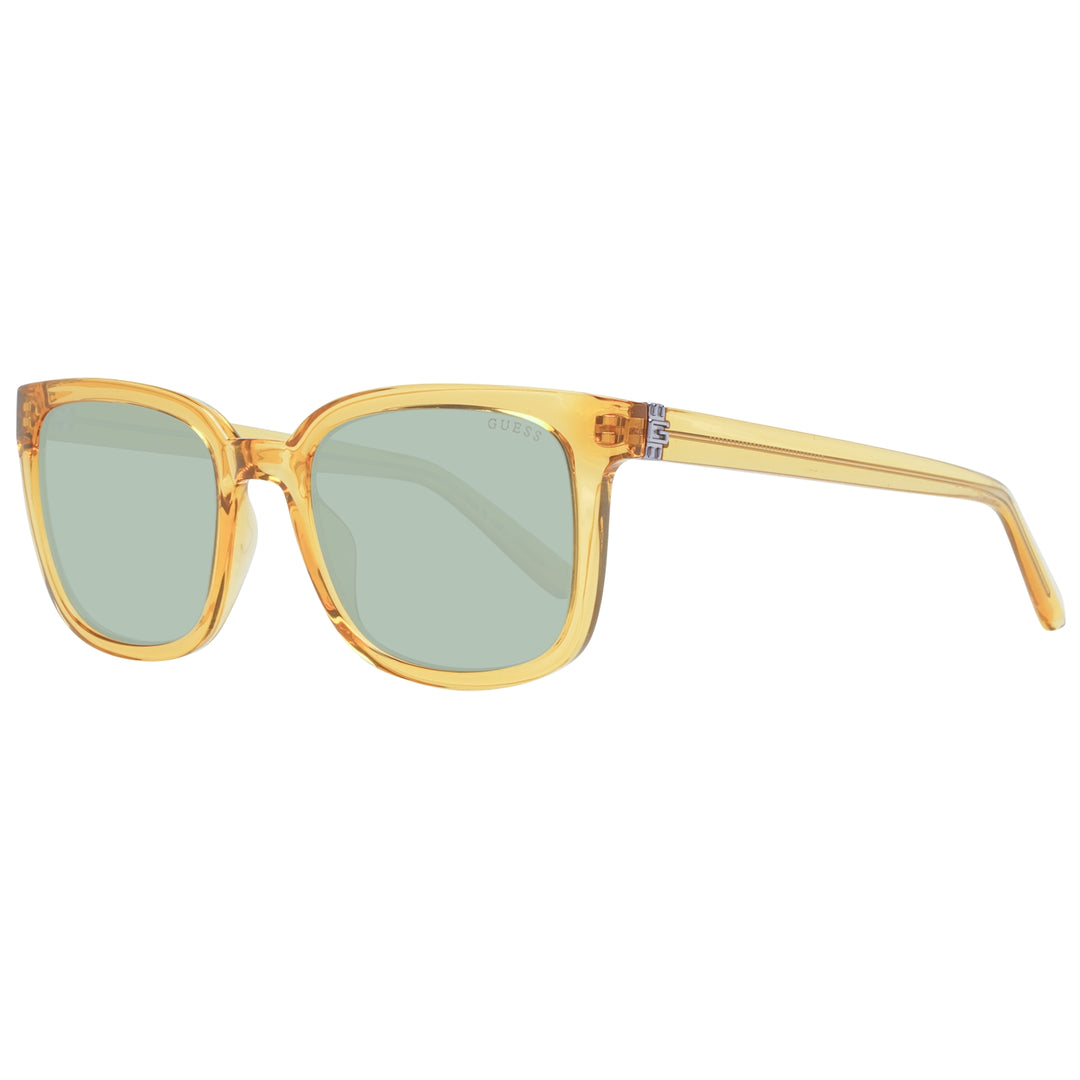 Unisex amber transparent square sunglasses with green lenses and visible metal hinge detail on sides