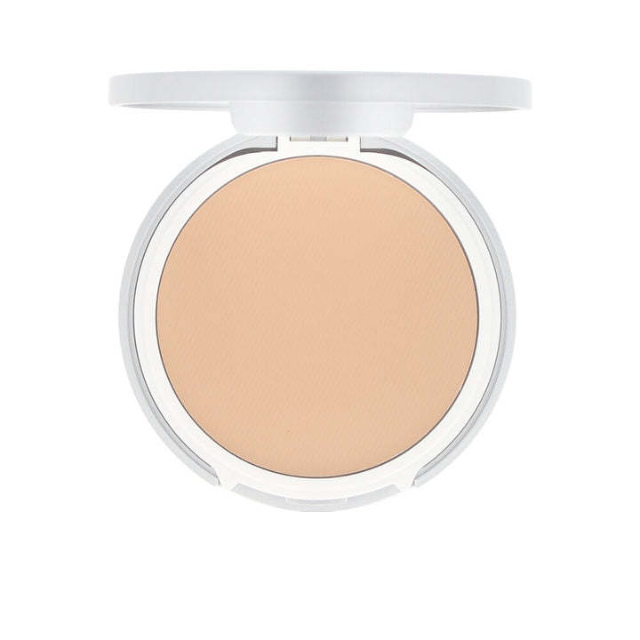 Pressed matte compact powder in warm sand shade, SPF 50+ compact with sponge