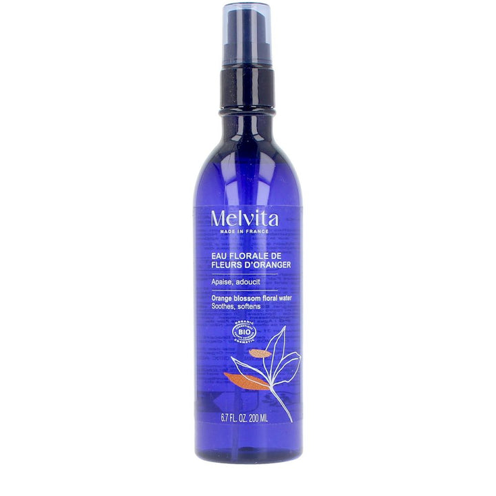 Melvita Blue plastic floral water spray bottle with spray nozzle, minimalist botanical illustration label