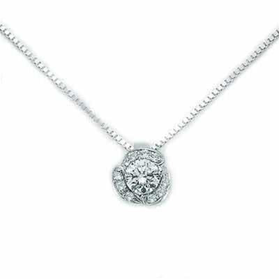 Platinum pendant necklace featuring a single brilliant-cut diamond on a delicate chain, high-polish finish
